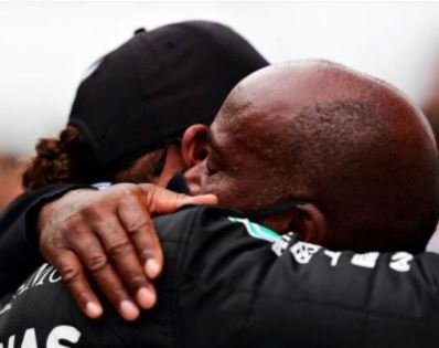 Anthony Hamilton and his son Lewis Hamilton hugging